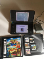 Nintendo dsi xl (black) with 5 games for sale