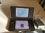 Nintendo dsi xl (black) with 5 games for sale