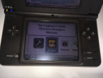 Nintendo dsi xl (black) with 5 games for sale