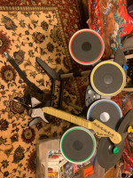 Wii plus rock band plus drums and guitar and 11 games