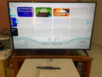 Nintendo Wii with 8 games including Super Mario Bros & Mario Kart 64