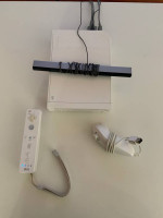 Nintendo Wii with 8 games including Super Mario Bros & Mario Kart 64