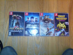 Nintendo Switch Lite with games cases controller