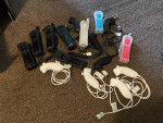 Nintendo Wii  Remotes + Nunchucks