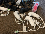 Nintendo Wii  Remotes + Nunchucks