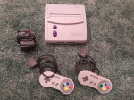 SNES JR. with 2 remotes and power supply