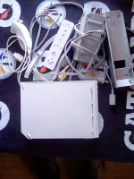 Wii with 5 games, 1 nunchuck, 1 controller