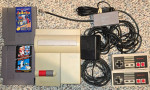 Top Loader Nintendo NES Console complete with games Burger time Mario