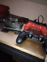 Ps4 Slim° •2controllers•Ps charger base•14 games•