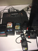 atari 2600 (#2) console vader (black model) for sale with 15 games
