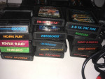 atari 2600 (#2) console vader (black model) for sale with 15 games