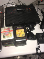 atari 2600 console (#1) (vader black model) with 15 games for sale