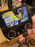Sony Playstation PSP GO 16gb with 8 Games