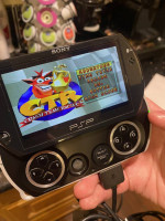 Sony Playstation PSP GO 16gb with 8 Games