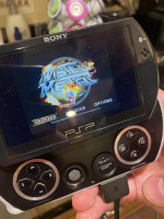 Sony Playstation PSP GO 16gb with 8 Games