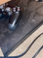 Playstation 4 slim, black, good condition (clean and sanitize before using it!)