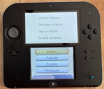 Nintendo 2DS Handheld Gaming System WITH FIVE Game Cartridges ALL EXCE