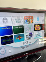 Nintendo Wii Console w/ Nunchuck WiiMote Cables and 5 Games