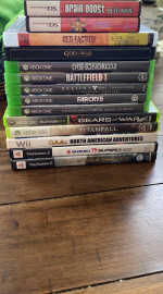 various game console game’s lot for sale for $75