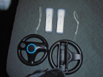 new 2 wii controllers /2 steering wheels