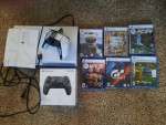 Almost Brand New Sony Playstation 5. 7 games 2 controllers