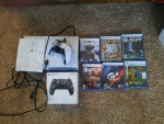 Almost Brand New Sony Playstation 5. 7 games 2 controllers