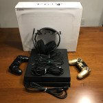 PS4 (500 GB) w/2 Controllers (Gold & Black) & 7 Games