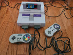 SNES Super Nintendo console, 2 controllers, 1 game, tested working