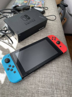 Nintendo Switch Neon Red and Neon Blue Joy-Con Console & 4 Premium Gam