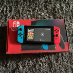 Nintendo switch console original box, extra controller, case and glass