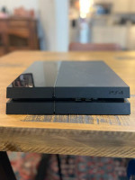 PS4, controllers, and 21 games