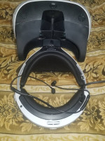 sony playstation vr headset, controls, and headphones