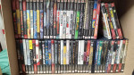 PS2 bundle lots of games and controllers