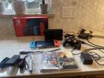 Nintendo Switch 32GB Handheld Console - Neon Red/Neon Blue Plus More