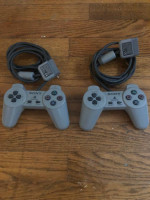 2 Sony Play Station controllers