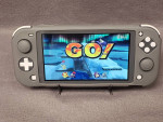 Nintendo Switch Lite w/Super Smash Bros Ultimate Game+ More