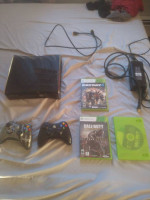 Xbox 360 with 2 controllers and a few games