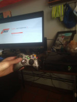 Xbox 360 with 2 controllers and a few games
