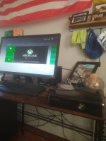 Xbox 360 with 2 controllers and a few games