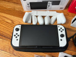 Nintendo Switch OLED + Pro Controller, Case, Grips, 2 Games (Zelda)