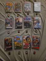 Nintendo Switch with 12 Hard copy Games with plug in controllers