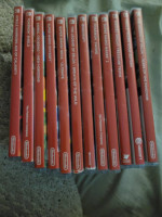 Nintendo Switch with 12 Hard copy Games with plug in controllers