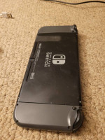 Nintendo Switch with 12 Hard copy Games with plug in controllers