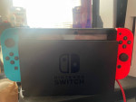 Nintendo Switch with case and extra conroller