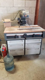 Craftsman 10 inch radial arm saw with cabnet