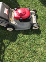 Honda Harmony 215 self propel dual blade mulching lawn mower