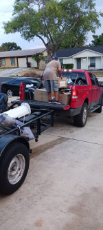 Junk removal and moving services weekday special $200,1 trailer load + truck bed