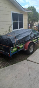 Junk removal and moving services weekday special $200,1 trailer load + truck bed