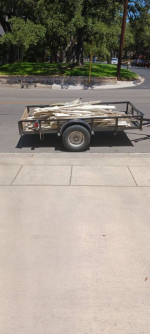 Junk removal and moving services weekday special $200,1 trailer load + truck bed