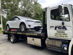FLATBED TOWING 24 HR SERVICE